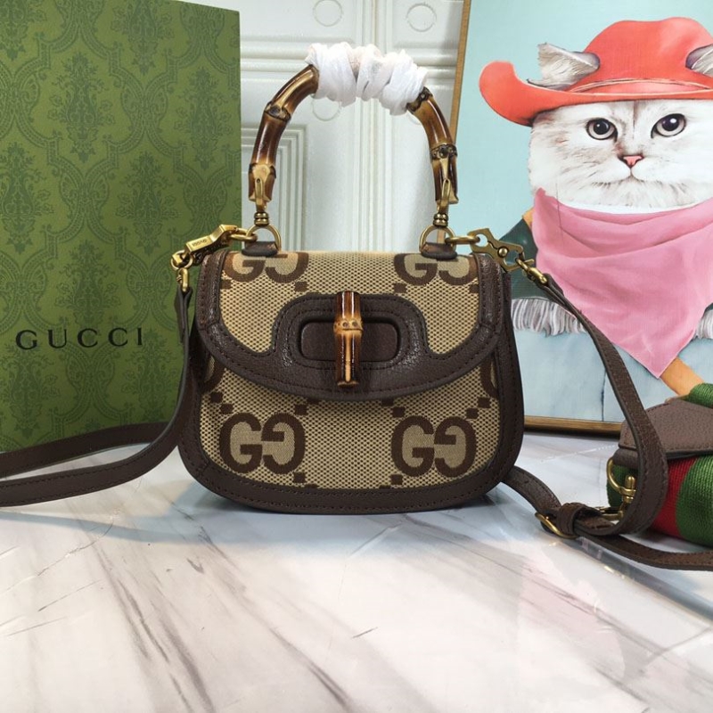 G*u*i top handle bags